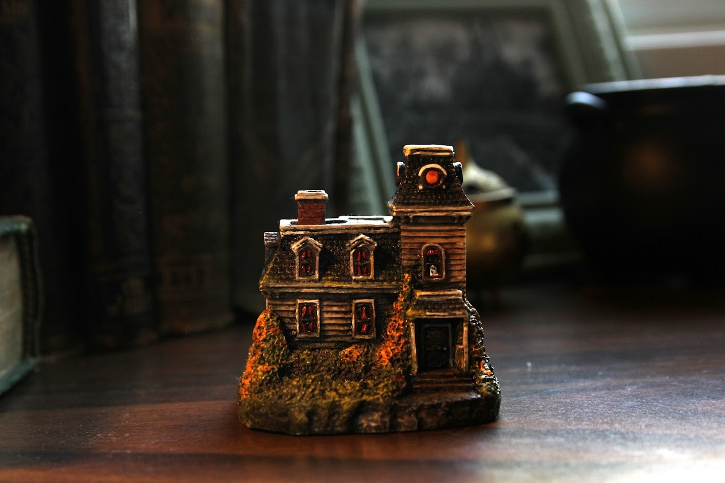 Image of a painted haunted house figurine